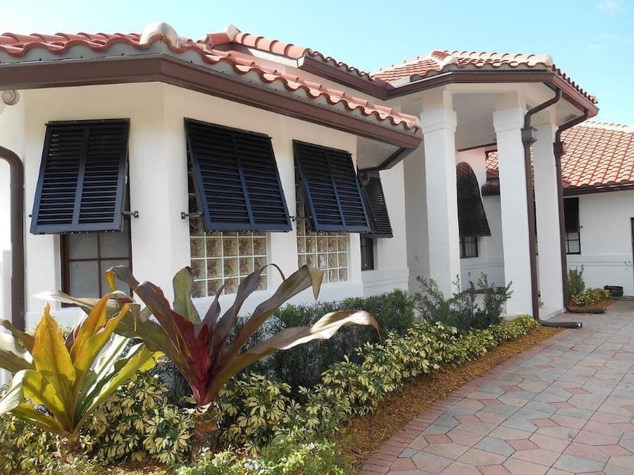 Impact shutters on home