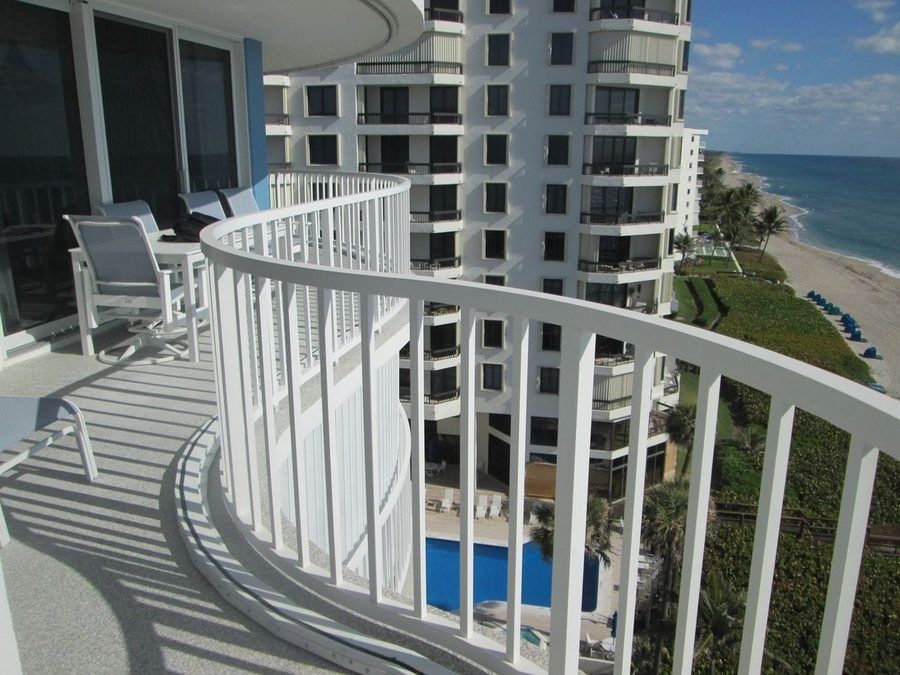 Condominium building in Florida with a scenic view of the beach from the balcony